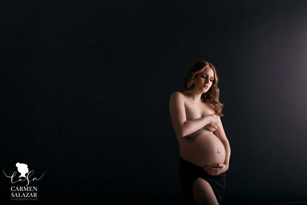 Maternity Boudoir, black background, topless blonde; Carmen Salazar Photography