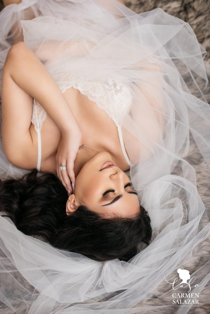 Bridal Boudoir Photo Inspiration in Sacramento by Carmen Salazar; brunette in white lingerie with white veil