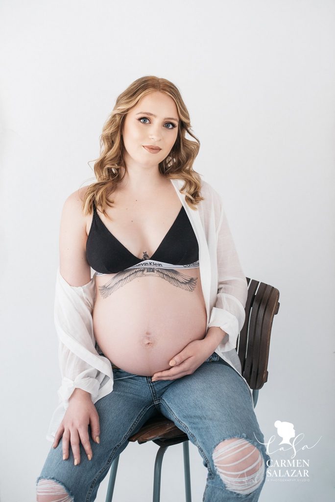 blonde woman in bra and jeans, maternity boudoir photography, Carmen Salazar Photography