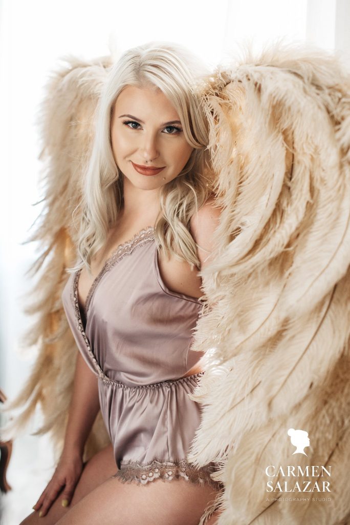 blonde model with angel wings; boudoir portraits by carmen salazar