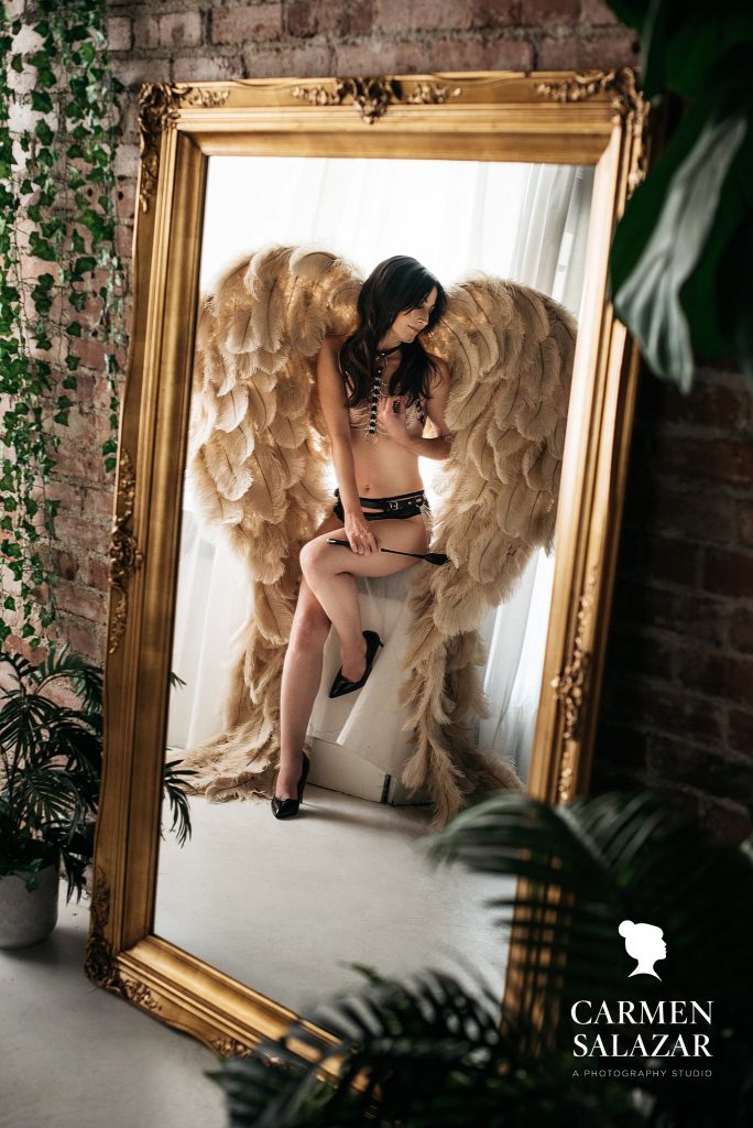 Dominatrix inspired boudoir photography with angel wings