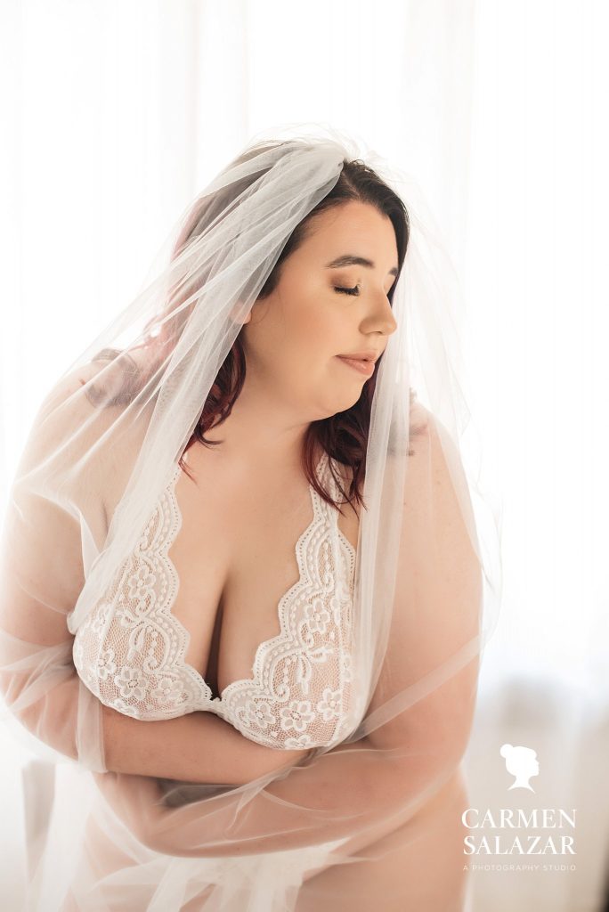 woman in bridal lingerie; boudoir photography repeat clients, photography by Carmen Salazar
