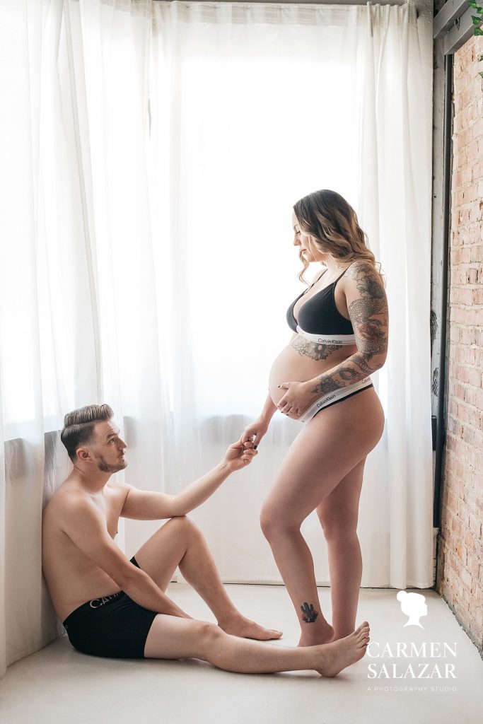 Couple in matching Calvin Klein Intimates, Couple’s Maternity Boudoir Photography by Carmen Salazar