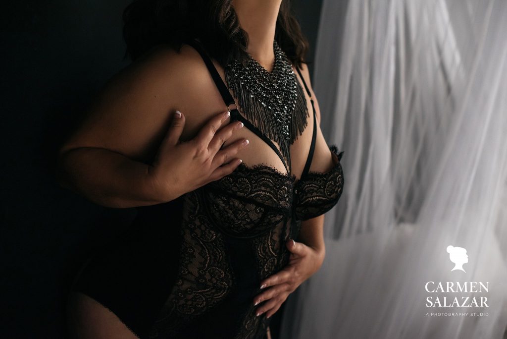 Woman in black lingerie with black backdrop; Boudoir Beauty at Any Age; by Carmen Salazar