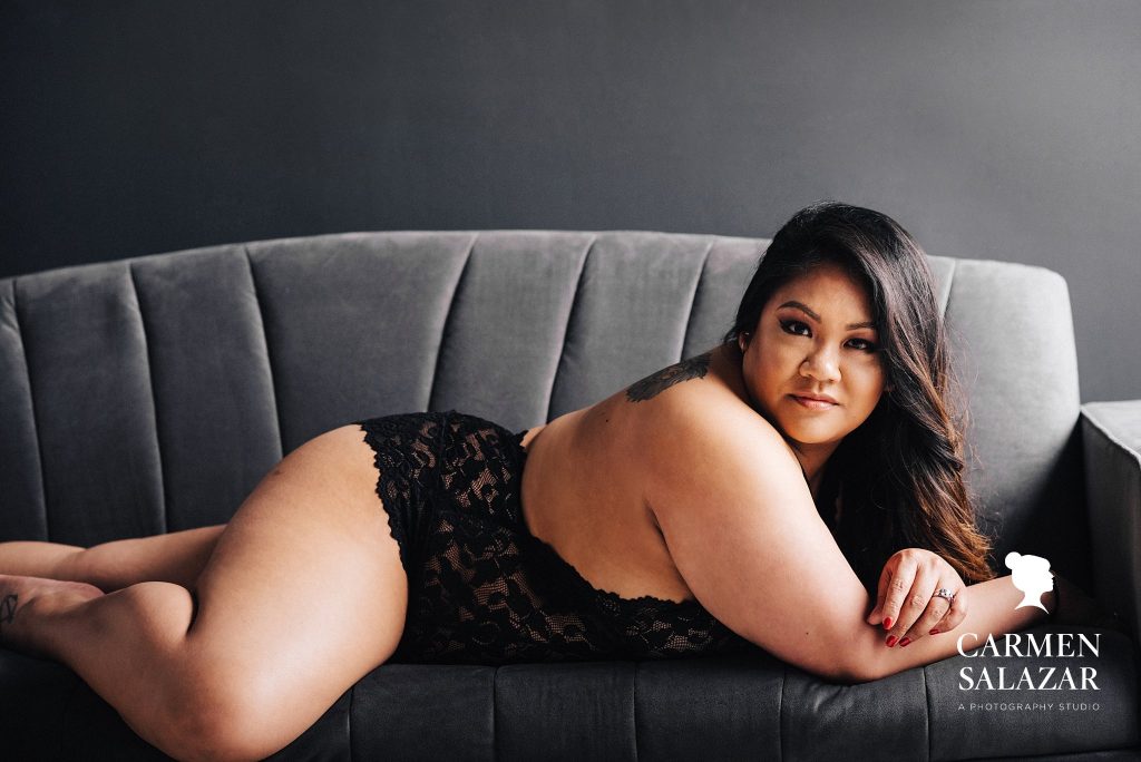 Celebrate Your Body; curvy woman in black teddy during boudoir photography session by Carmen Salazar