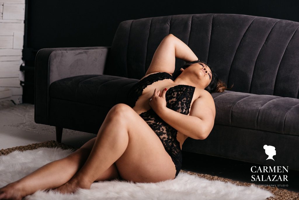 Celebrate Your Body; curvy woman in black teddy during boudoir photography session by Carmen Salazar