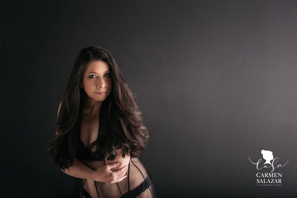 women in sheer 2 piece lingerie in front of black wall, boudoir photography by Carmen Salazar