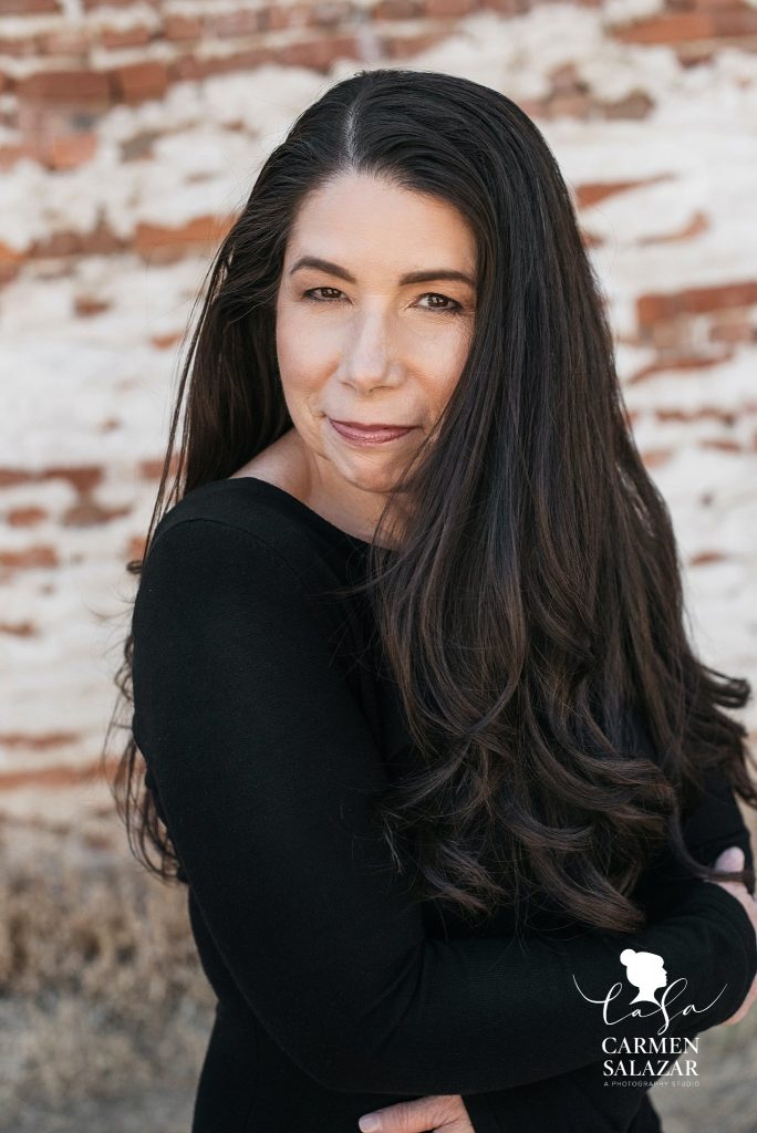 Headshots, woman in black, by Carmen Salazar