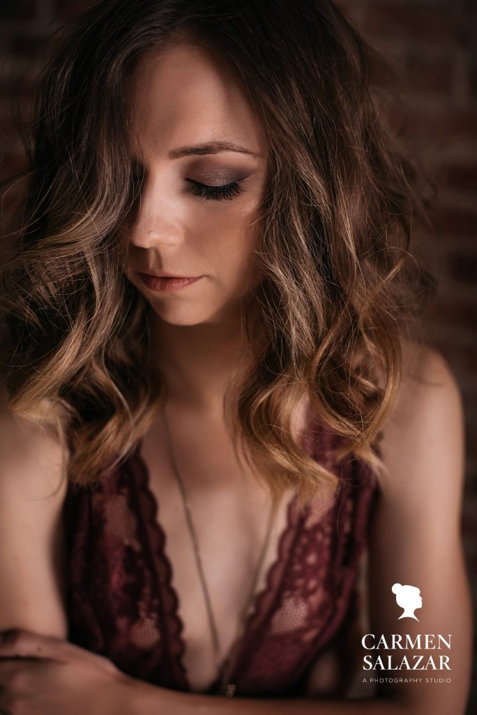 close up of woman in burgundy lingerie; boudoir photography by Carmen Salazar