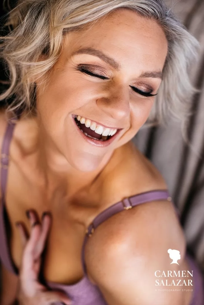 Short Haired woman in violet bra, boudoir photography by Carmen Salazar