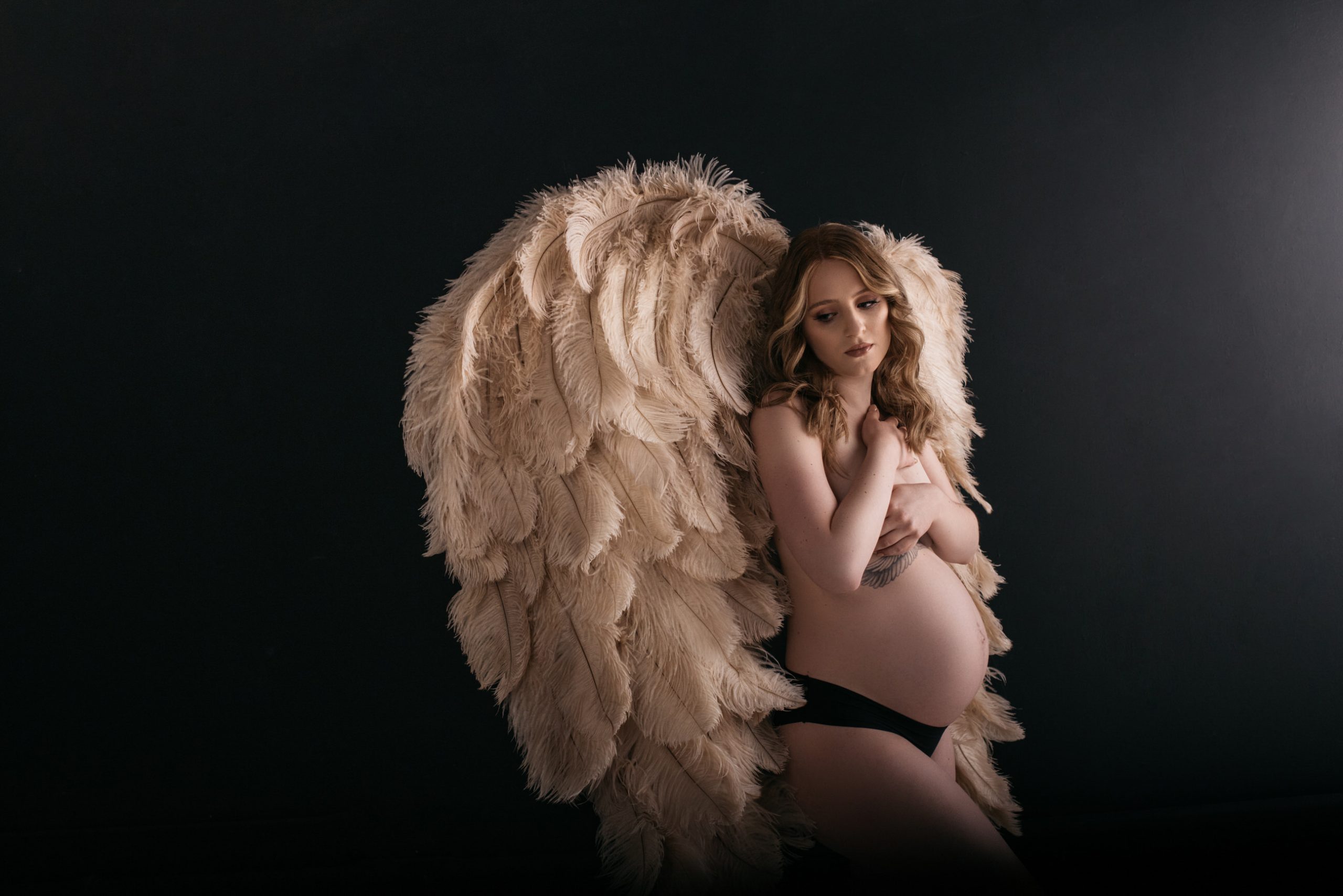 Angel-wings-maternity-photos-in-Sacramento